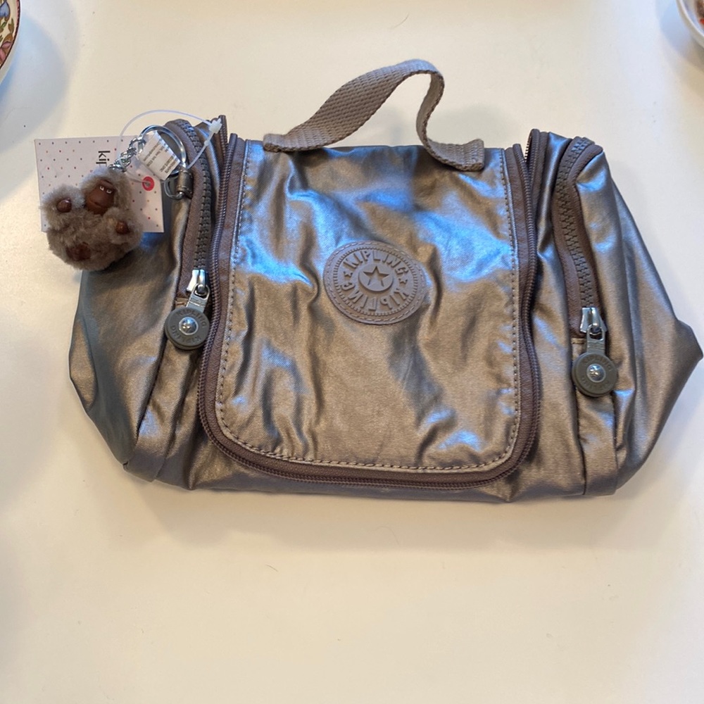 Kipling metallic pewter hanging cosmetic case